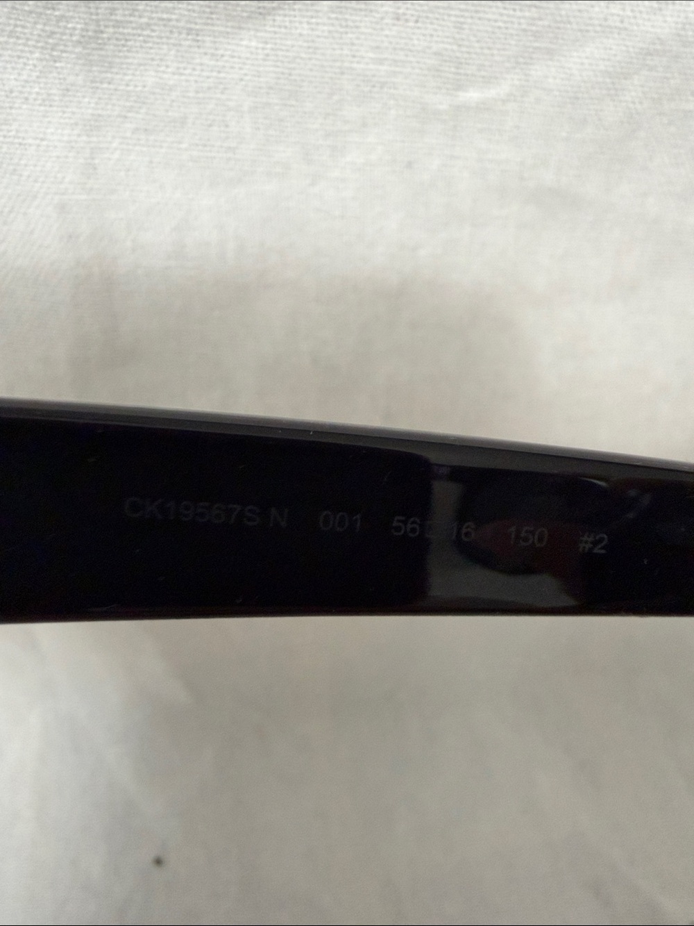 Calvin Klein Glossy Black Sunglasses with Smoke Lenses - Picture 4 of 5
